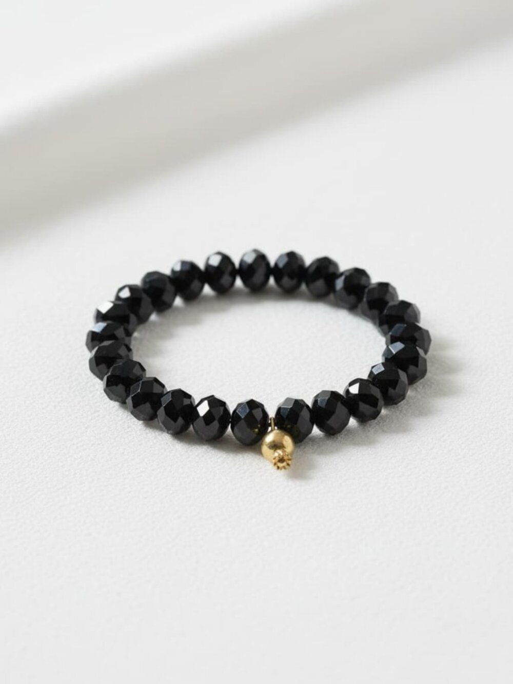 Black Czech Glass Bead Bracelet with Brass Pomegranate